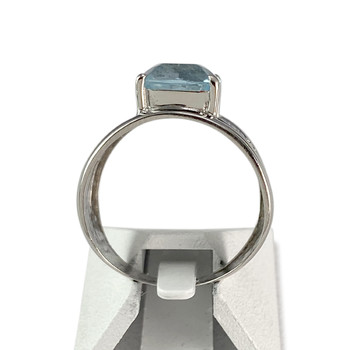 Second-hand gold ring 750 white blue topaz treated with diamonds
