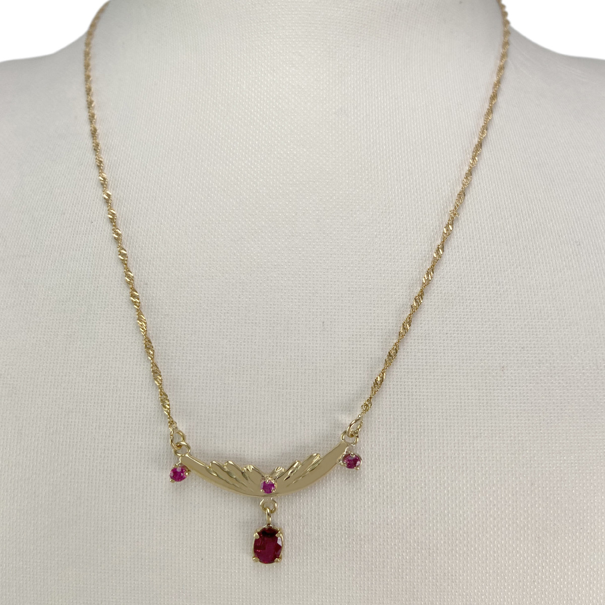 Collier d'occasion or 750 jaune torsadée rubis - vue 2