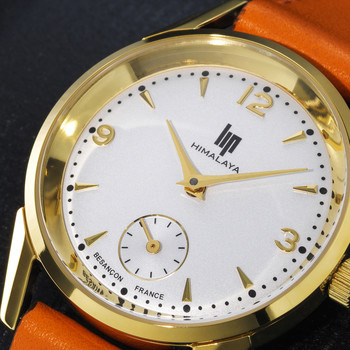 Montre Lip femme acier doré bracelet cuir orange