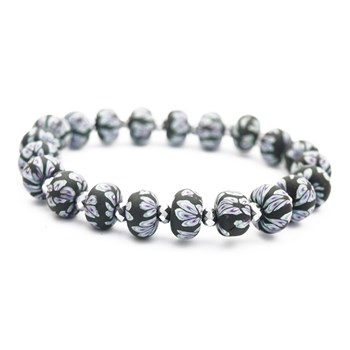 Bracelet élastique perles fleurs noires et perle cristal