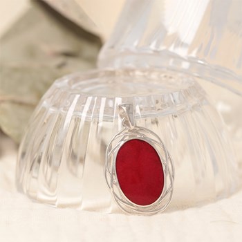 Gros pendentif en corail rouge dans son nid d'argent 925 rhodié