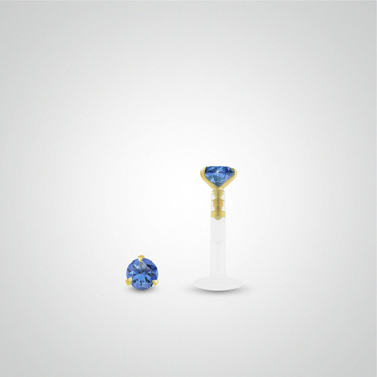 Piercing hélix : or jaune avec oxyde de zirconium bleu foncé