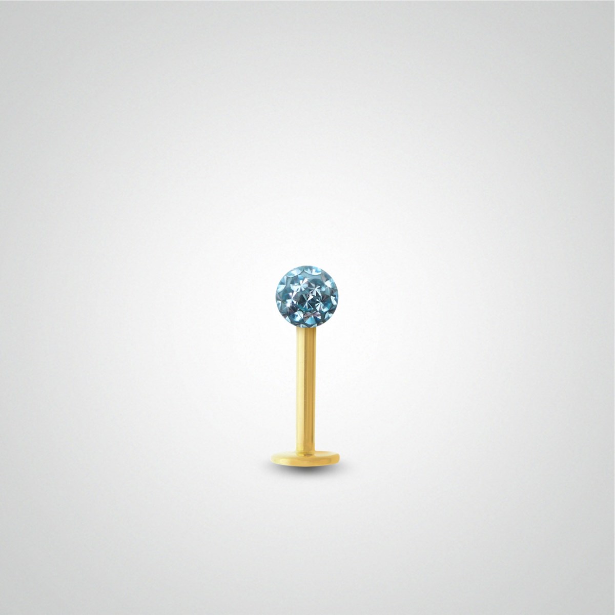 Piercing tragus en or jaune et cristal de Swarovski bleu clair