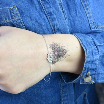 Bracelet main de Fatma serti d'oxyde de zirconium oeil bleu Argent 925 Rhodié