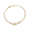 Bracelet fin en acier doré avec perles blanches - vue V1