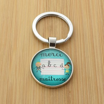 Porte-clés Merci Maîtresse alphabet écriture argenté