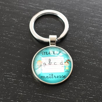 Porte-clés Merci Maîtresse alphabet écriture argenté