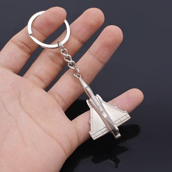 Porte-clés avion de chasse argenté