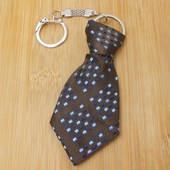 Porte-clés cravate en tissu forme géométrique croisés noir bleu argenté