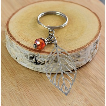 Silver openwork leaf keyring with orange faceted pearl