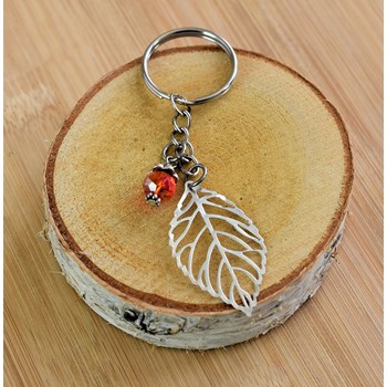 Silver openwork leaf keyring with orange faceted pearl