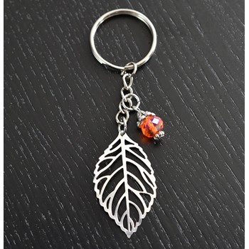 Silver openwork leaf keyring with orange faceted pearl