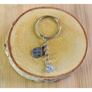 Infinity medal and zirconium oxide key ring