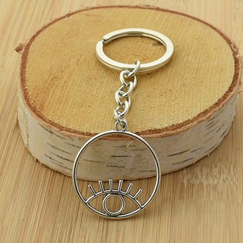 Eye in a silver circle key ring