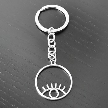 Eye in a silver circle key ring