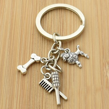 Silver dog sitter groomer key ring