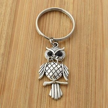 Porte-clés hibou yeux noirs articulé argenté
