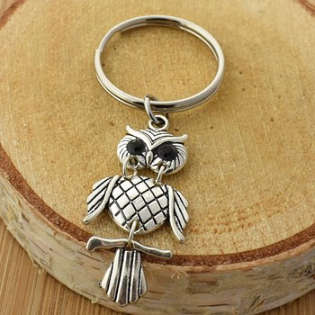 Porte-clés hibou yeux noirs articulé argenté