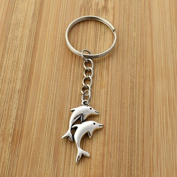 Silver dolphin couple key ring