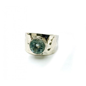 Bague jonc en argent et topaze bleue facettée