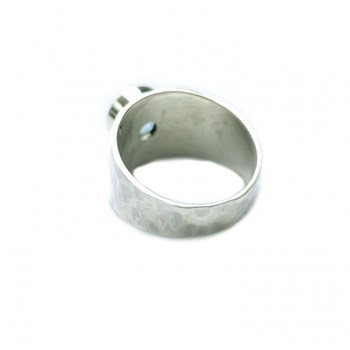 Bague jonc en argent et topaze bleue facettée