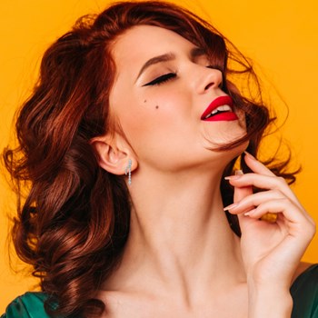 SC Crystal earrings adorned with Zirconium