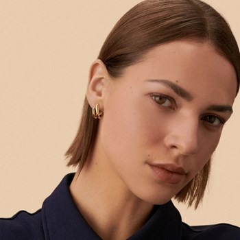 Boucles d'oreilles Agatha Trijonc demi-créoles
dorées