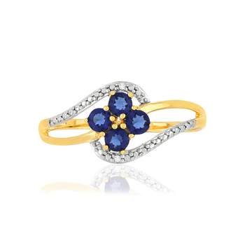 Gele 375-goudring met opengewerkte design, saffieren en diamanten