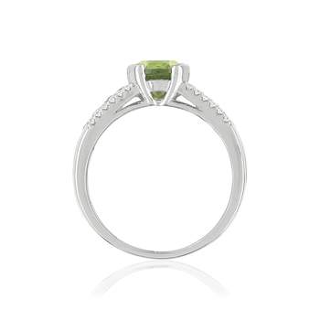925 sterling silver oval ring with green imitation stones and zirconias