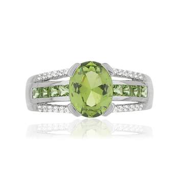 925 sterling silver oval ring with green imitation stones and zirconias