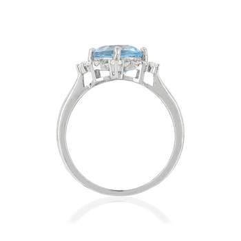 925 silver ring with treated blue topaz and zirconias