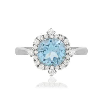 925 silver ring with treated blue topaz and zirconias