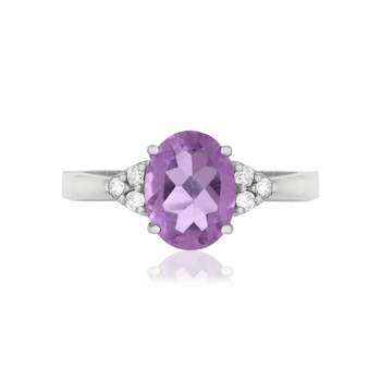 Ring van 375 witgoud met ovale amethist en zirkonia’s