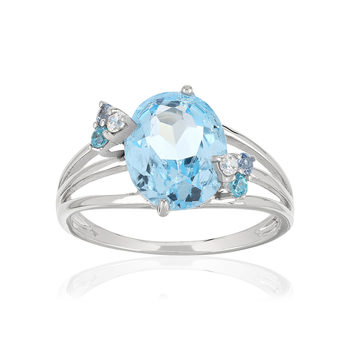 Ring van 375 witgoud met behandelde blauwe topaas en witte topaas