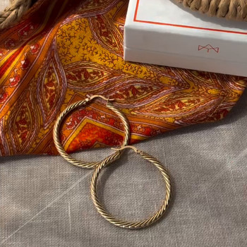 Gold-plated twisted hoop earrings 40 mm