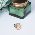 Créoles plaqué or triple anneau croisés - vue D3