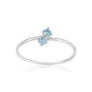 375 white gold ring with treated topazes