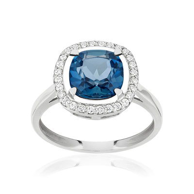 Bague or blanc 375 topaze London Blue traitée zirconias