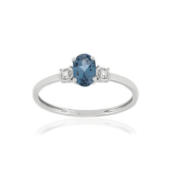Bague or blanc 375 topaze bleue traitée diamants