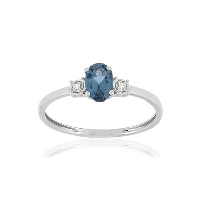 Bague or blanc 375 topaze bleue traitée diamants