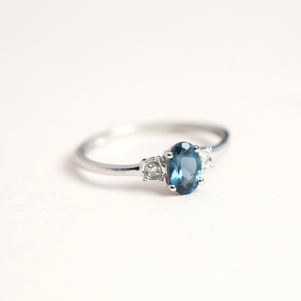 375 White Gold Ring with Treated Blue Topaz and Diamonds - View D3
