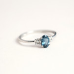 375 White Gold Ring with Treated Blue Topaz and Diamonds - View D3
