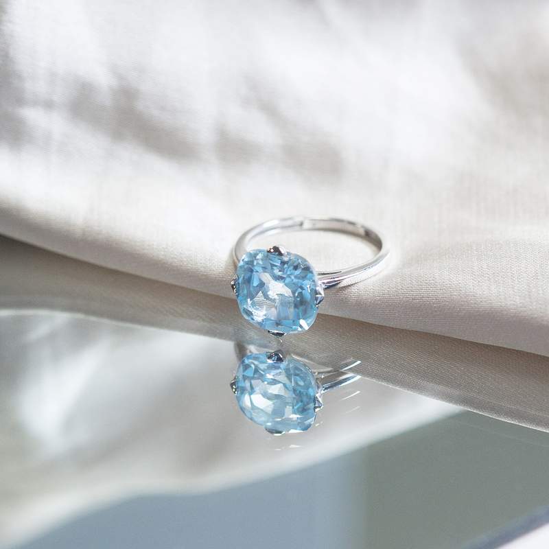 Bague or blanc 750, 1 topaze bleue traitée 5 carats. - vue D3