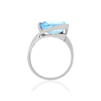 Bague or blanc 750, 1 topaze bleue traitée de 5,25 carats.