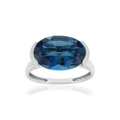 Bague or blanc 750, 1 topaze London Blue traitée de 7,42 carats.