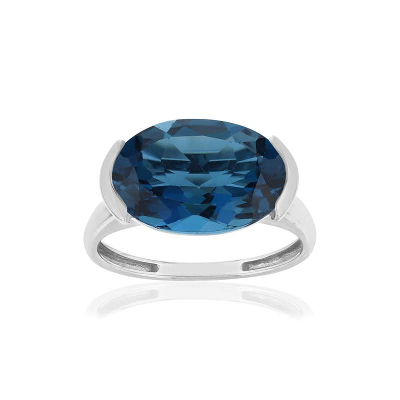 Bague or blanc 750, 1 topaze London Blue traitée de 7,42 carats. - vue 1