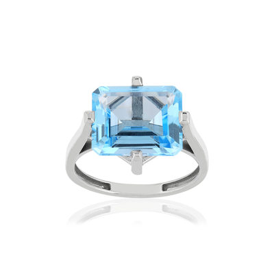 Bague or blanc 750, 1 topaze bleue traitée de 7,33 carats.