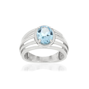 375 white gold ring, 1 treated blue topaz, 1.75 carats.