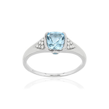 Bague or blanc 375, topazes bleue traitées et diamants.