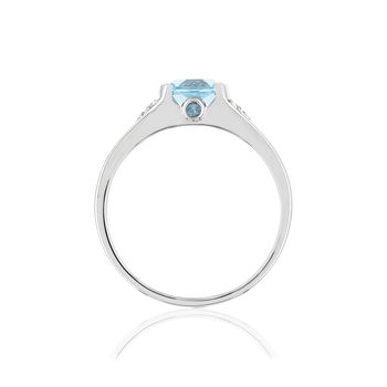 Bague or blanc 375, topazes bleue traitées et diamants.